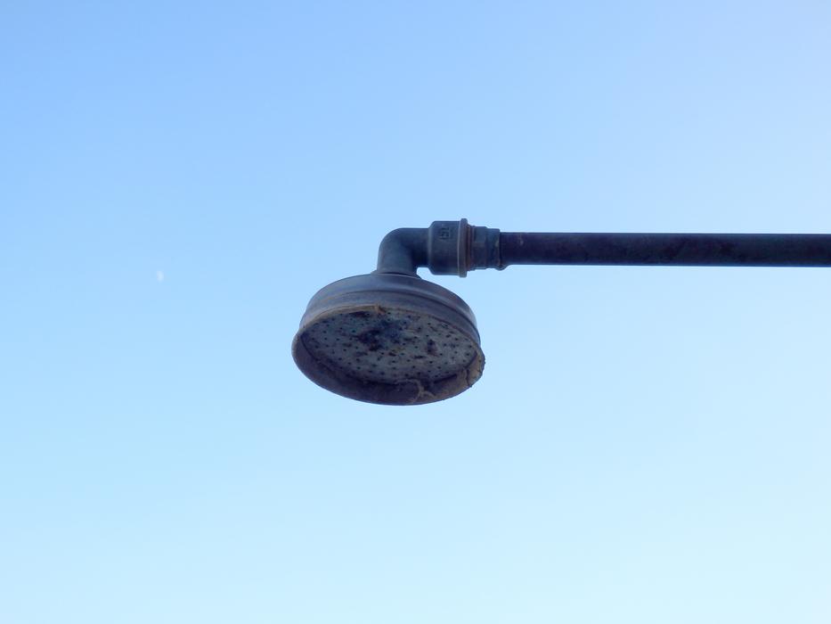 Close-up of the showerhead, under the blue sky