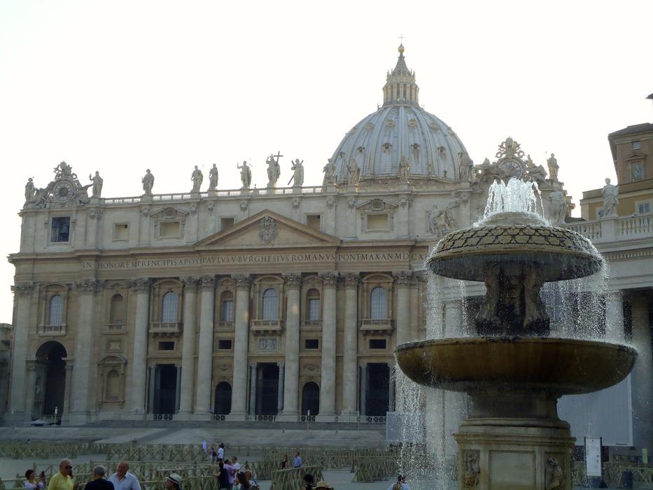 People at the beautiful square with buildings and fountain, in Rome, Italy