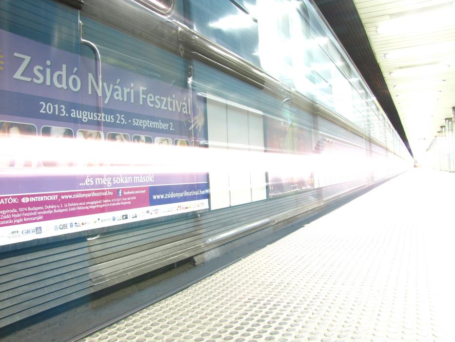 the train is traveling on the subway at speed