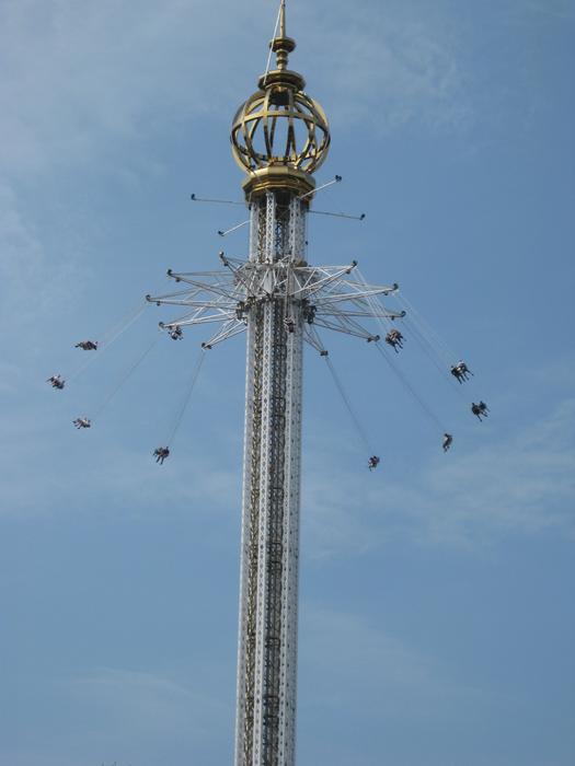 carousel in the square against the blue sky