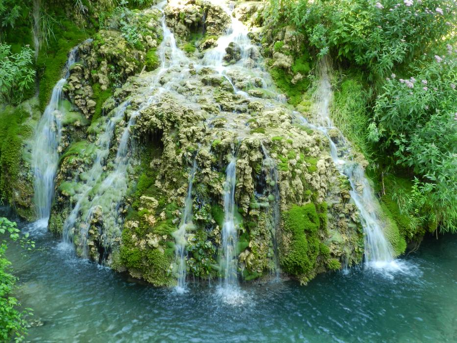 waterfall on a rock near the sea