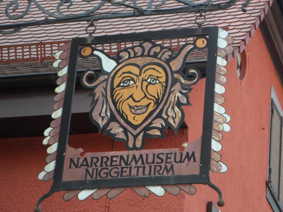 advertising sign at the Narrenmuseum Niggelturm in Gengenbach, Germany