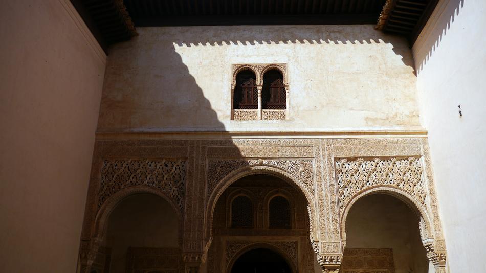 Beautiful Alhambra with patterns, in sunlight and shadows, in Granada