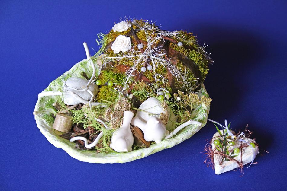 exposition of stone with moss on a plate