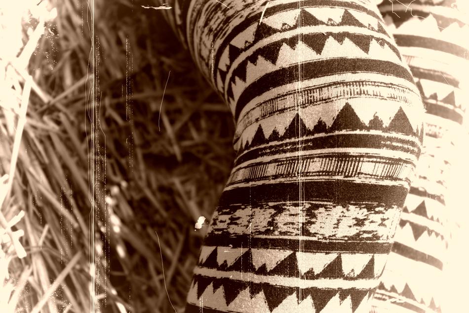 female legs in striped pants at Hay Curves