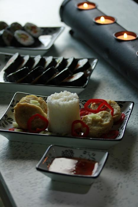 sushi, rice, red pepper and soy sauce