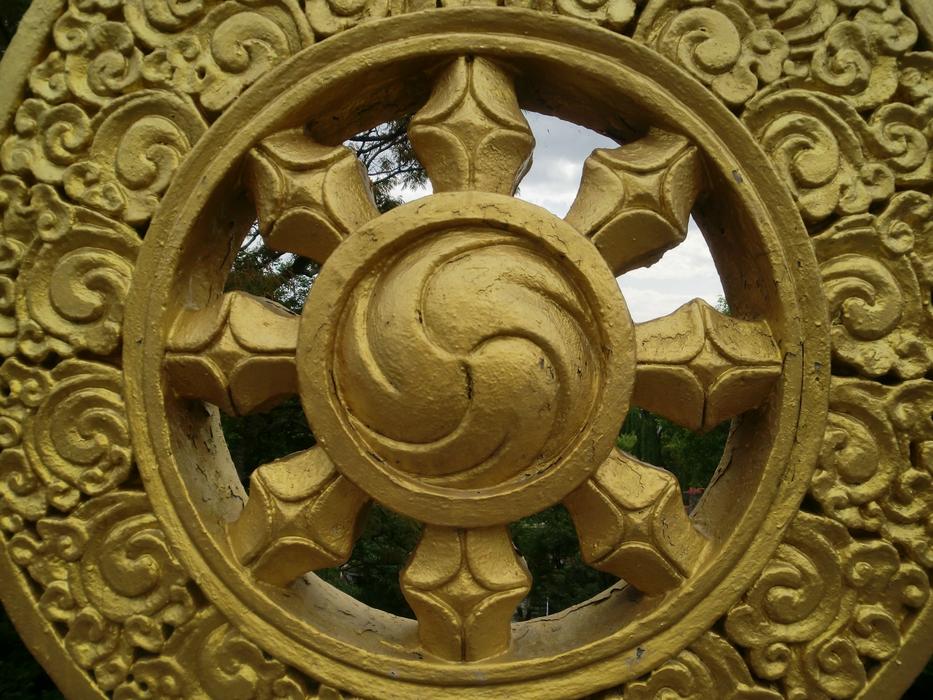 golden symbol on a monastery in tibet