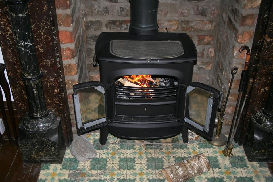 wood burning stove with open doors
