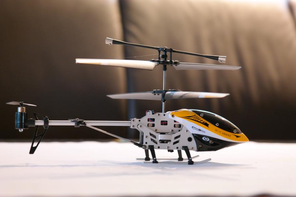 Colorful model of the helicopter in light
