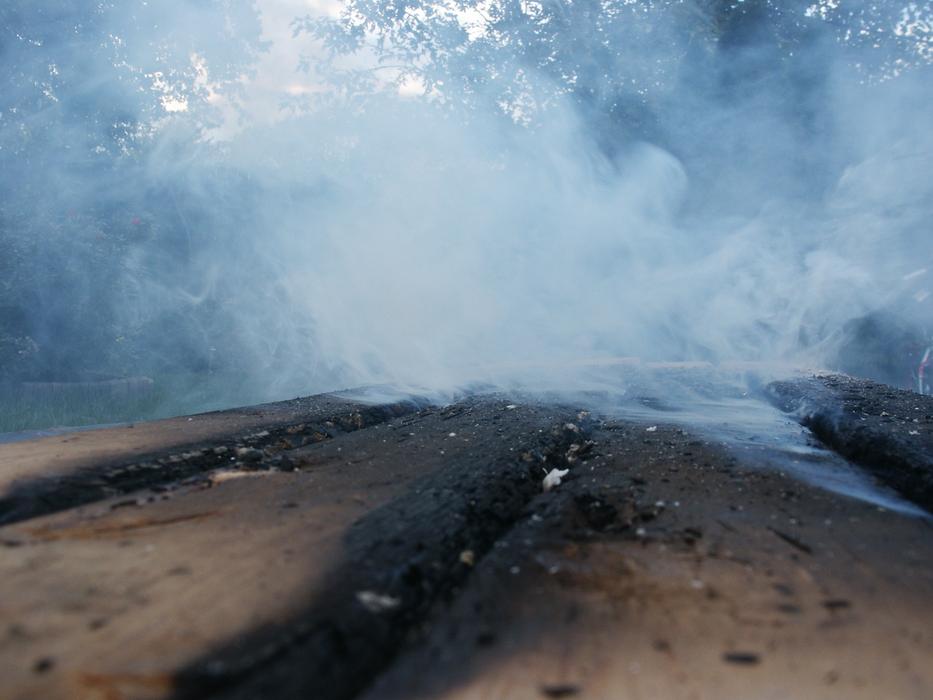 Close-up of the the wood, in smoke