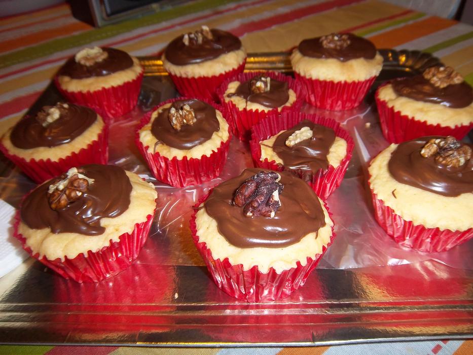 Close-up of the cupcakes with chocolate, in red cover