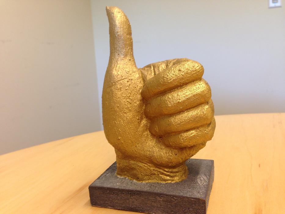 Thumbs Up as a Statue Gold