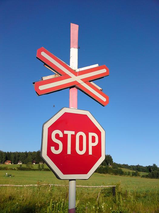 Stop Blue shield on meadow