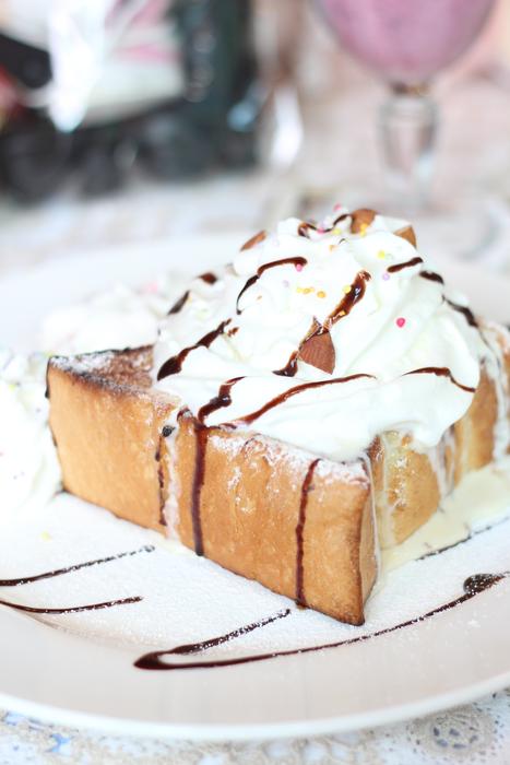 Piece of the beautiful and colorful cake with cream
