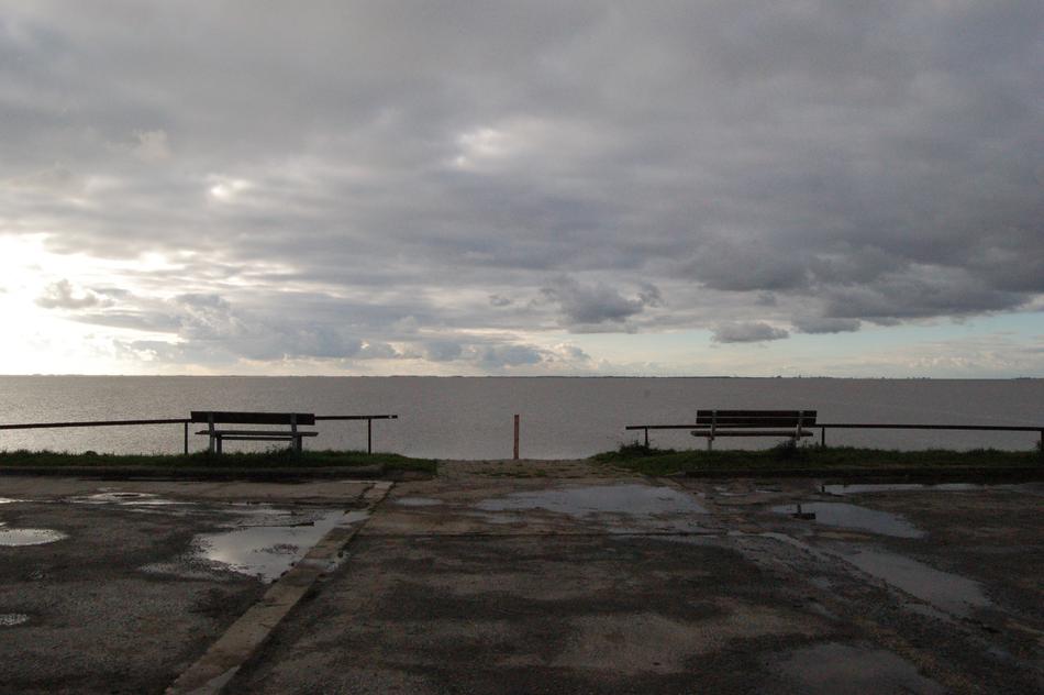 Coast of Dollart in East Frisia, Germany, under the clouds in sunlight