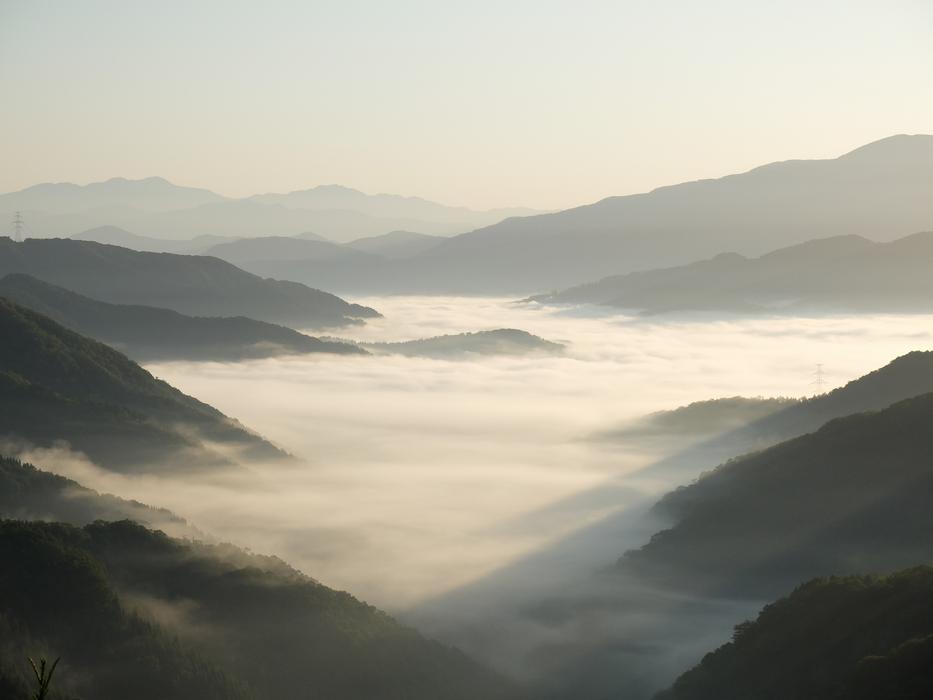 Beautiful landscape of the mountains in fog, in colorful and beautiful light
