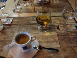 coffee and cognac on table