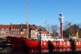red ship in port