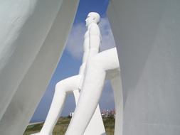 Large sculpture of a sitting man