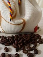 roasted coffee beans on white background