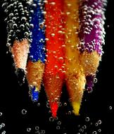 closeup view of Colored Pencils in Water