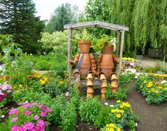 decoration in the form of people from flower pots