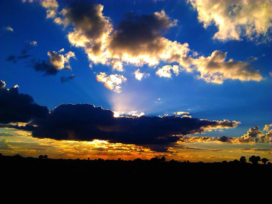 Sun Behind Clouds