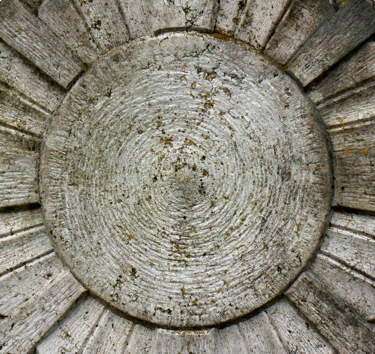 wooden sun symbol