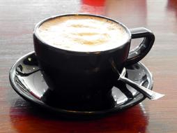 frothy coffee in cup