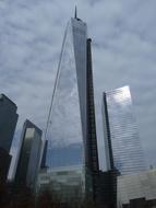 reflection of clouds on the facade of the World Trade Center in New York