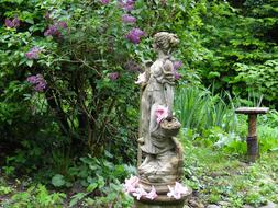 stone Figures in Garden Spring
