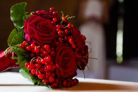 Bridal Bouquet red Roses close-up on blurred background