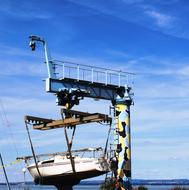 Sailing Boat raising on crane