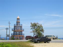 Lighthouse on Caribbean sea beach