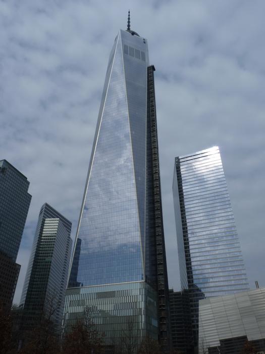 reflection of clouds on the facade of the World Trade Center in New York
