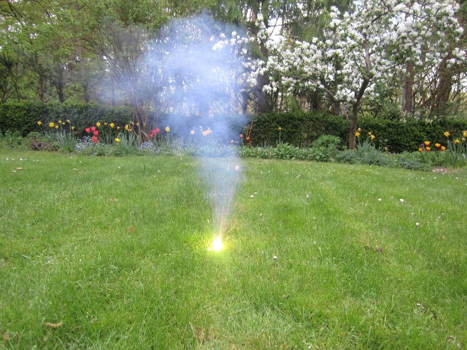 smoke from fireworks on the lawn