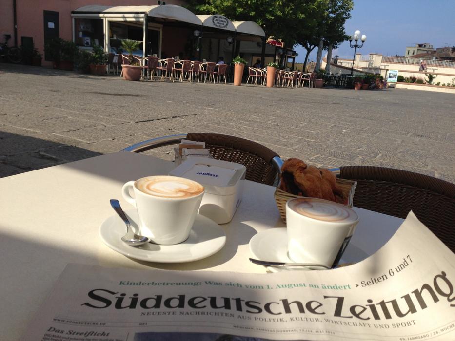 Newspaper Cafe Breakfast
