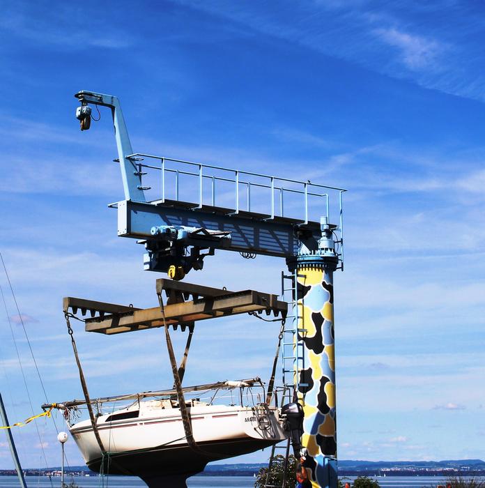 Sailing Boat raising on crane