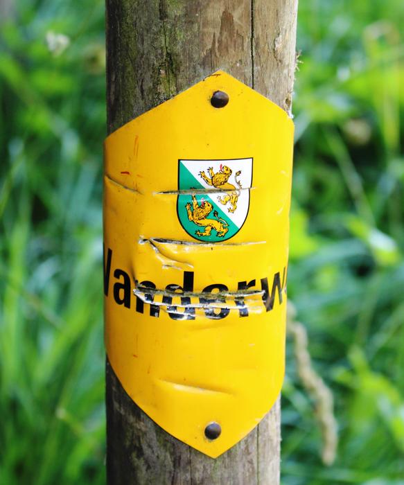 Official Signpost with coat of arms on Trail
