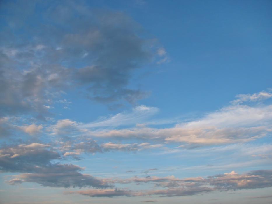 lines of clouds in the blue sky