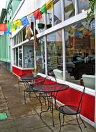 restaurant tables by window on street