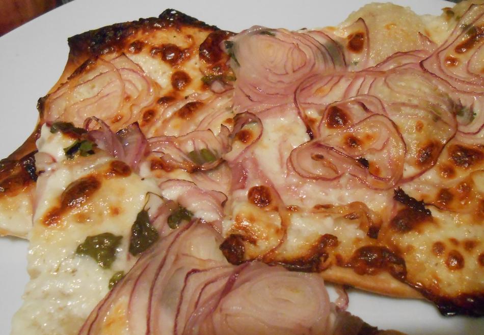Tartlet with Onion-Flambe from Goat meat