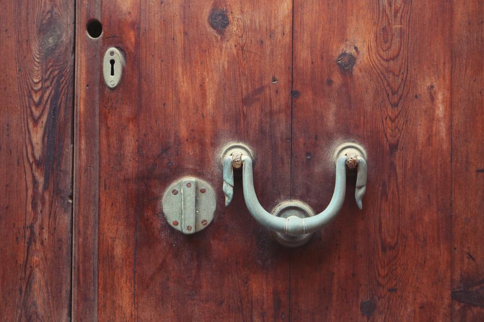 keyhole, knocker and old wooden door