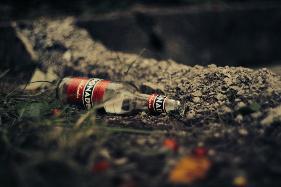 Dirty Bottle on Ground