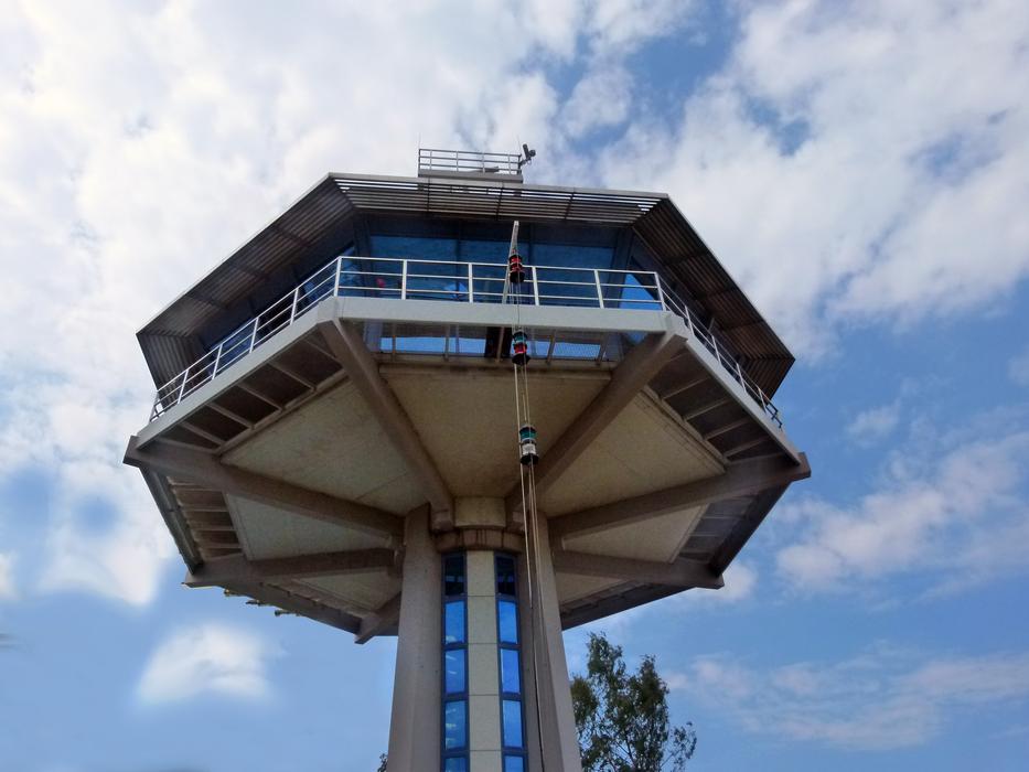 Airport's control tower at sky