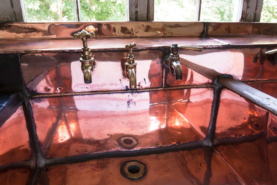 antique sink with brass taps