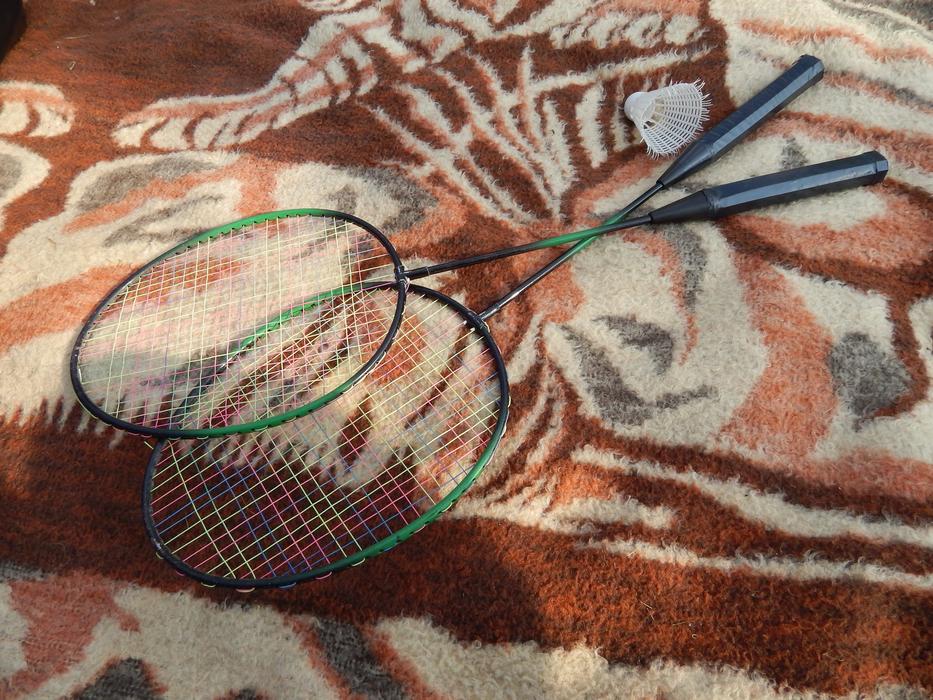 Tennis rackets lying on the mat