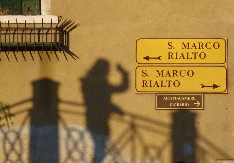 Shadow Waving and signs in Venice