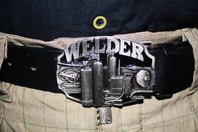 welder, Decorative buckle on Leather belt