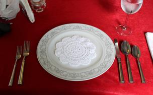 white plate with forks and spoons
